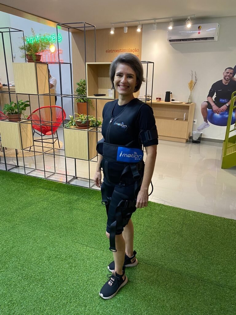 Cliente ÚNNIC durante programa de eletroestimulação